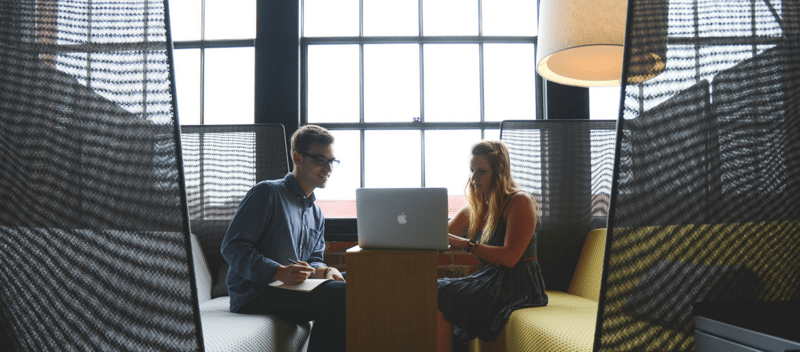 Two people working